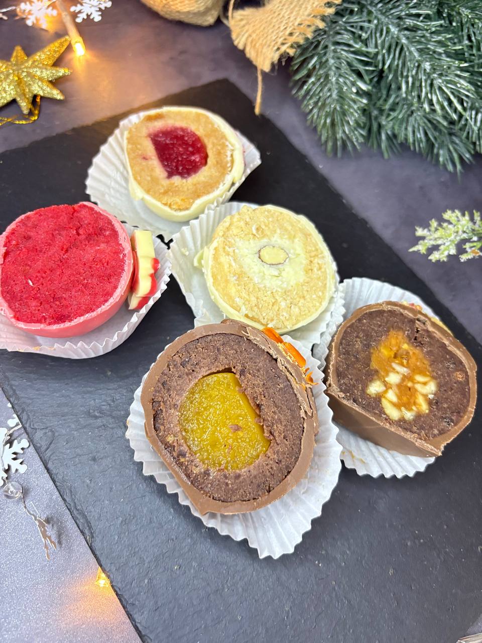 Cut truffles showing colorful fruit fillings