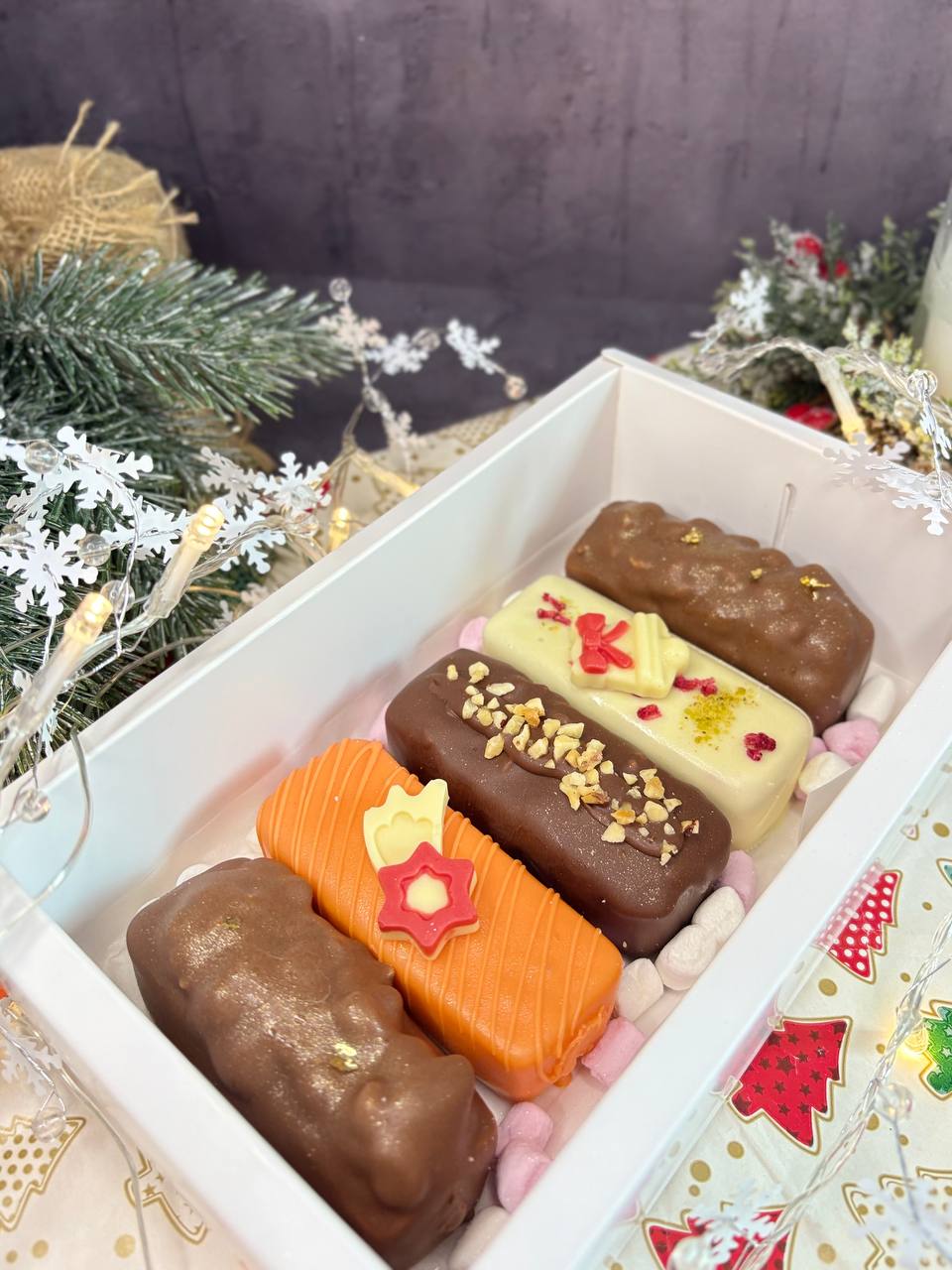 Christmas mousse bars box with festive decorations