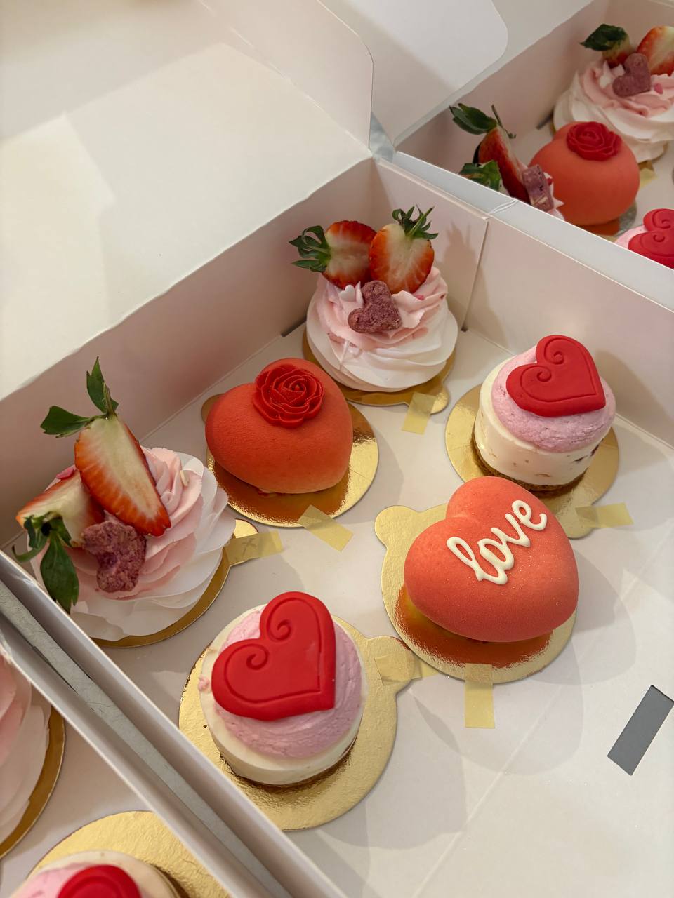 Mini Valentine mousse hearts with strawberries