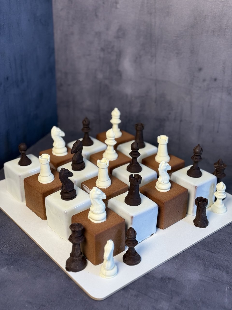 Chess-themed mousse dessert cubes